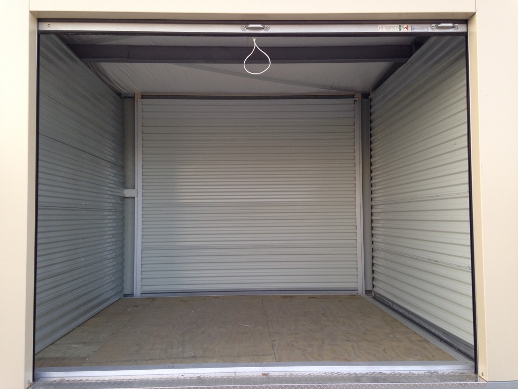 View of the inside of our 10' x 10' Modular storage units located in Davenport, Iowa. Includes Easy Drive-up Access with a wide paved driveway.