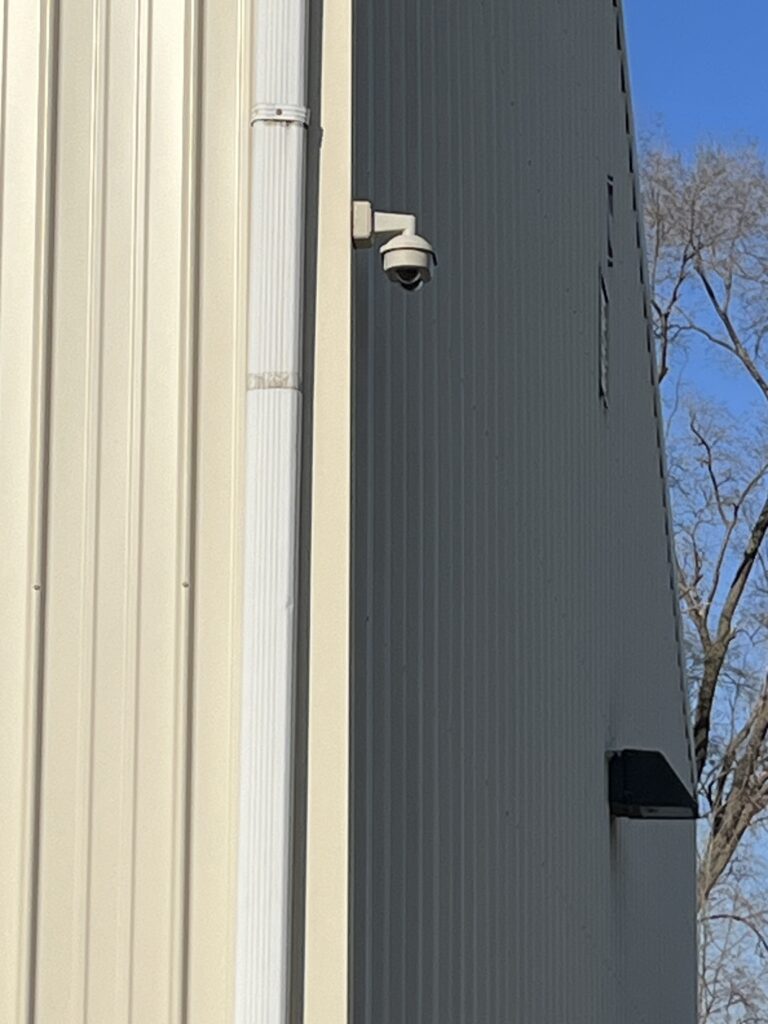 Security camera mounted on a building at Quad Cities Storage in Davenport, Iowa